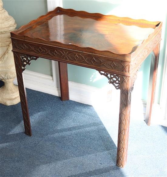 A Chippendale style blind fret-carved mahogany silver table and a Georgian style mahogany side table, W.69cm and W.137cm